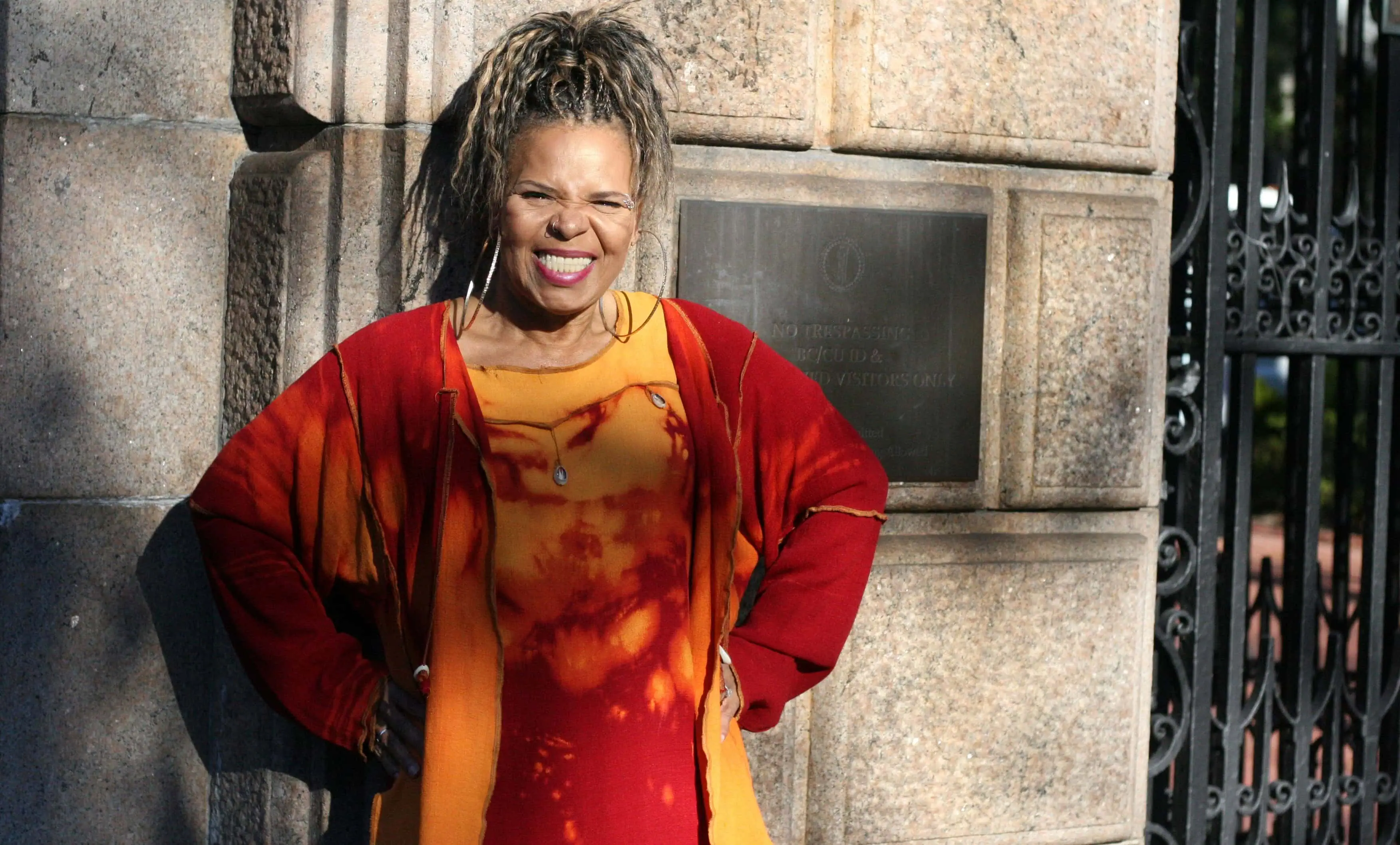 Ntozake Shange standing outside Barnard gates