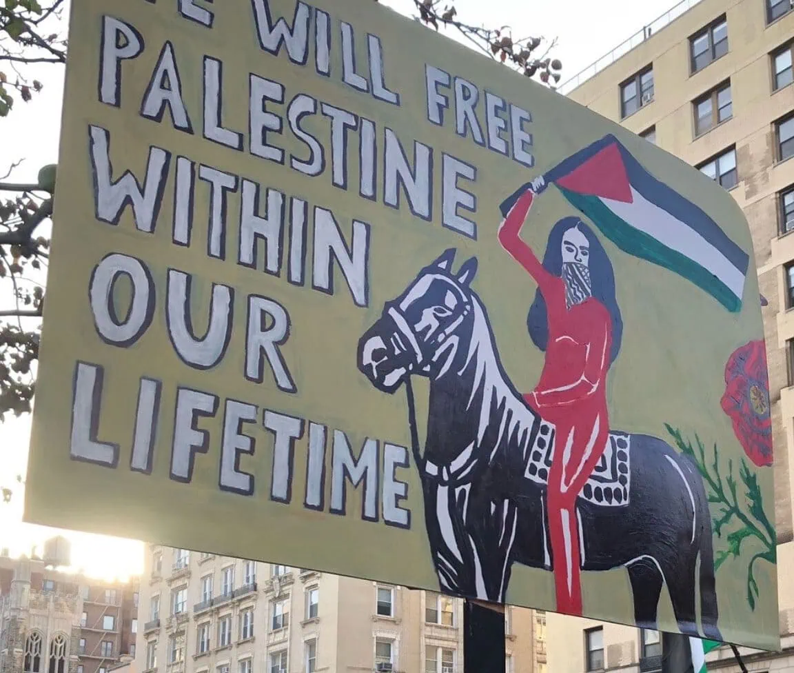 Activist protest banner supporting Palestinian independence and resistance.